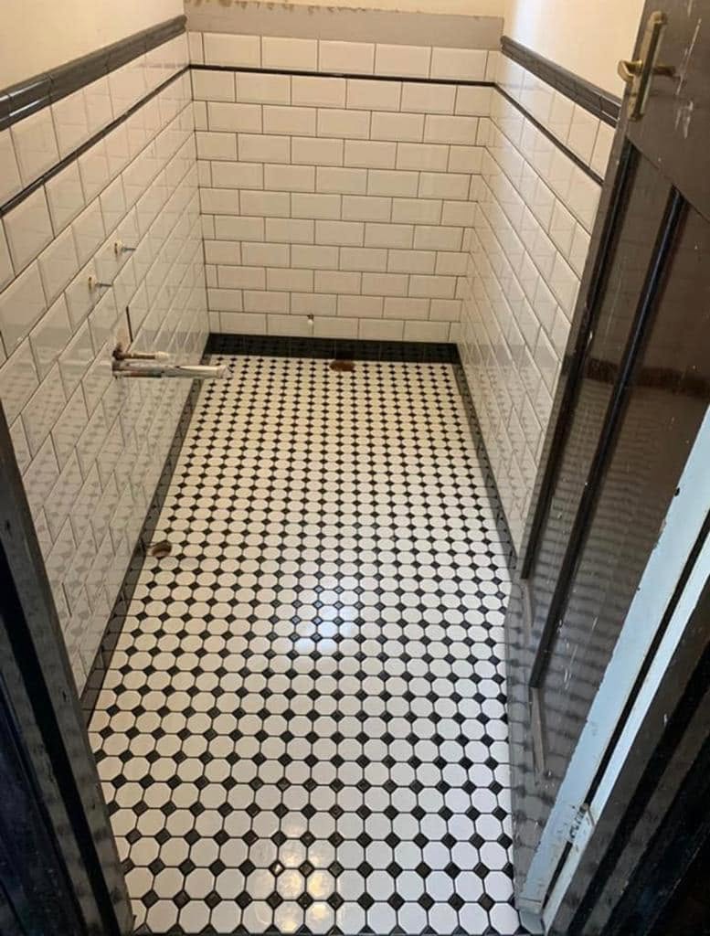 Victorian black and white mosaic floor with metro wall tiles
