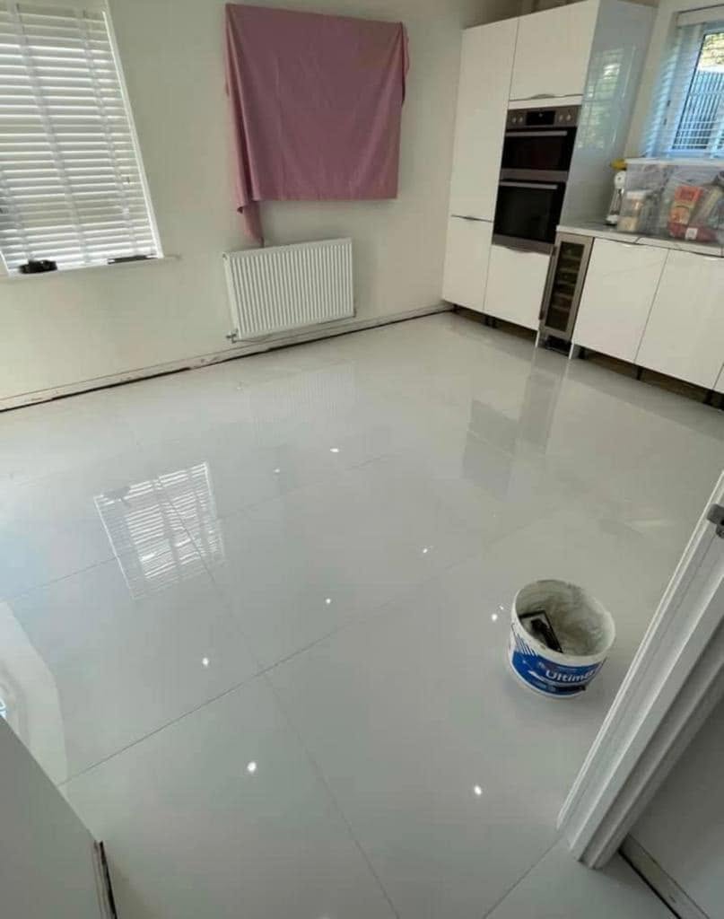 High-gloss white kitchen floor tiles